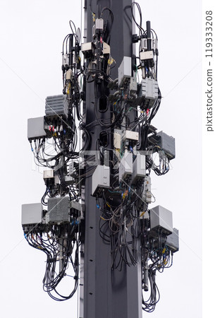 Wireless communication equipment mounted on big lightening pole, Isolated on white Wireless communication equipment mounted on big lightening pole, Isolated on white 119333208