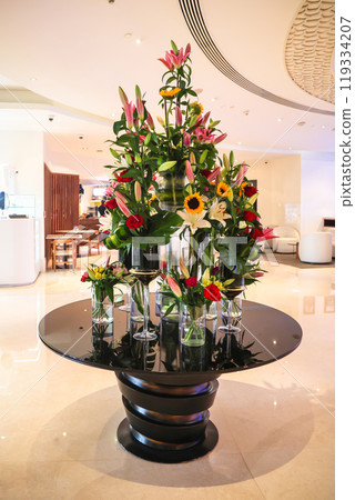 Beautiful luxurious bouquet of fresh flowers, flower arrangement in the hotel lobby 119334207