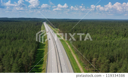 Aerial top view on country road in forest Aerial top view on country road in forest 119334386