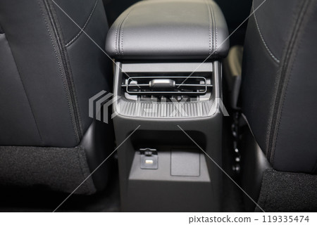 A close up of a car s rear air conditioning system A close up of a car s rear air conditioning system 119335474
