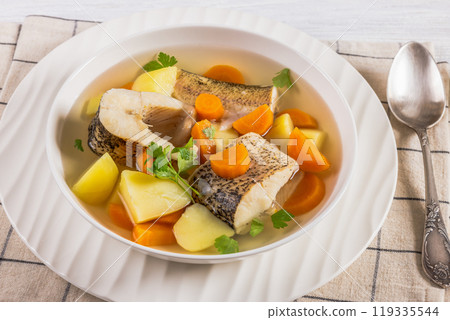 Clear Pike soup with veggies and spices, top view Clear Pike soup with veggies and spices, top view 119335544