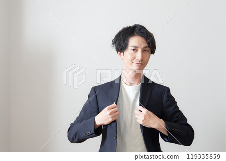 Portrait of a man in his 30s looking at you Business casual Portrait of a man in his 30s looking at you Business casual 119335859