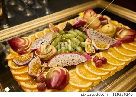 An Elegant and Colorful Fruit Platter Featuring a Variety of Exquisite Exotic Fruits An Elegant and Colorful Fruit Platter Featuring a Variety of Exquisite Exotic Fruits 119336246