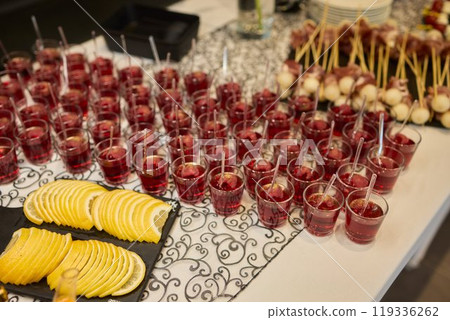 Beautifully Elegant Shots of Creamy and Luxurious Dessert Presented with Gold Decor 119336262