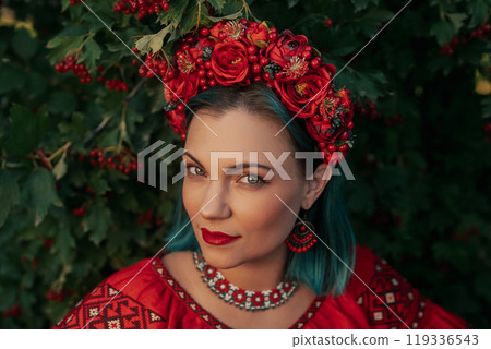 Charming Ukrainian Woman In Traditional Outfit, Wreath. Red viburnum tree. 119336543