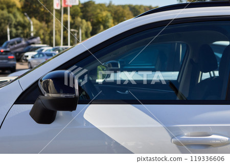 Car Sales and Loan Industry Concept. Row of Brand New Vehicles in Stock. Car Sales and Loan Industry Concept. Row of Brand New Vehicles in Stock. 119336606