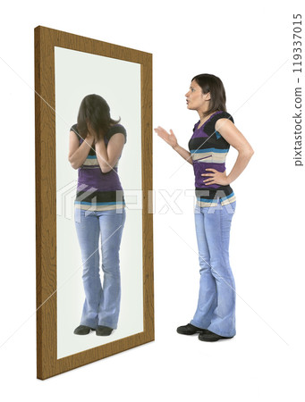 Woman scolding herself in a mirror 119337015