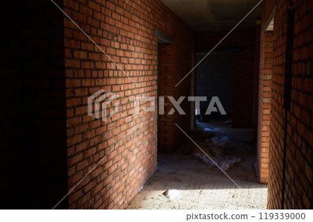 Construction worker laying bricks on exterior walls Construction worker laying bricks on exterior walls 119339000