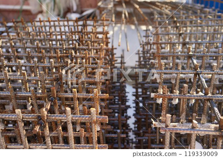 Reinforcement steel rod at construction site. Construction rebar steel work reinforcement. Rebar texture. Reinforcement steel rod. Rusty rebar for concrete pouring 119339009