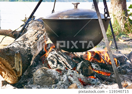 Pot on campfire 119340715