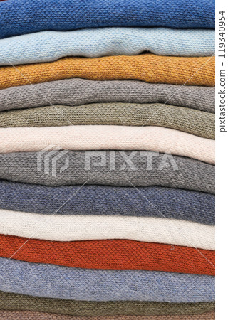 Beautifully Colorful Stacked Textiles Displayed in a Variety of Shades and Textures Beautifully Colorful Stacked Textiles Displayed in a Variety of Shades and Textures 119340954