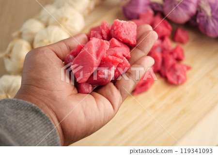 Fresh, uncooked meat pieces specifically meant for culinary preparation and cooking use Fresh, uncooked meat pieces specifically meant for culinary preparation and cooking use 119341093