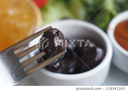 Tasty and Delicious Black Olives Presented Beautifully and Served with Various Dipping Sauces Tasty and Delicious Black Olives Presented Beautifully and Served with Various Dipping Sauces 119341163