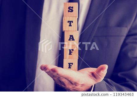 Balancing five wooden cubes spelling the word STAFF Balancing five wooden cubes spelling the word STAFF 119343463