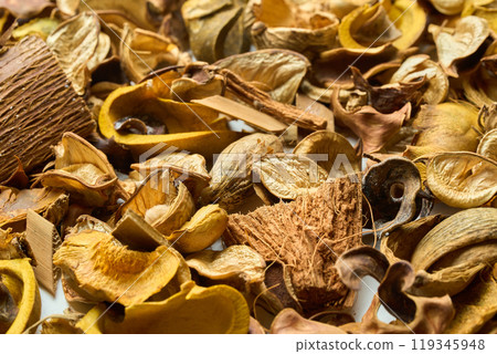A lot of fallen leaves and pine cones on a table A lot of fallen leaves and pine cones on a table 119345948