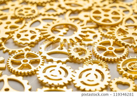 Many gears on a table 119346281