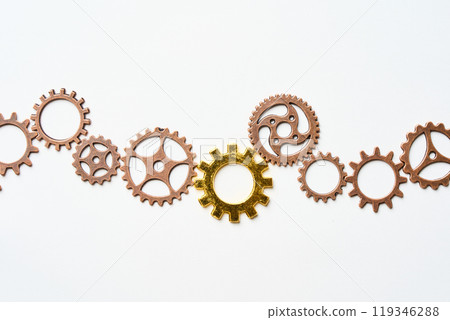 Many gears on a table 119346288