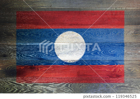 Laos flag on rustic old wood surface background Laos flag on rustic old wood surface background 119346525