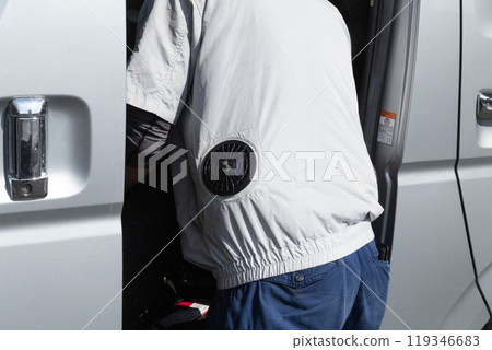 Workers unloading cargo Workers unloading cargo 119346683