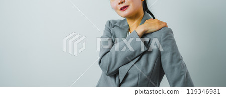 A woman with stiff shoulders 119346981