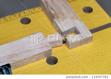 Senior man Cutting Dovetails With Woodworking Hand Tool for Hobby After retirement. Senior man Cutting Dovetails With Woodworking Hand Tool for Hobby After retirement. 119347762