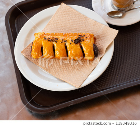 Chocolate puff pastry served for breakfast Chocolate puff pastry served for breakfast 119349316
