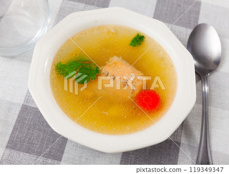 Portion of salmon offal soup 119349347