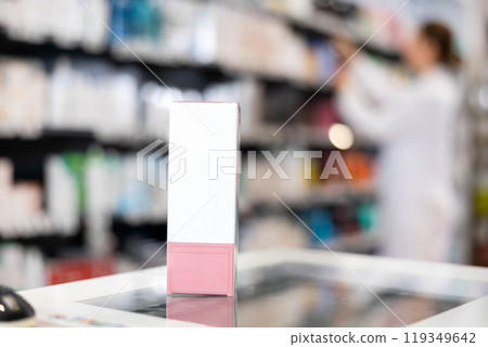 Box with cosmetic product on counter in pharmacy Box with cosmetic product on counter in pharmacy 119349642