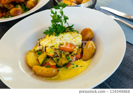 Hake fillet in Spanish style Hake fillet in Spanish style 119349868