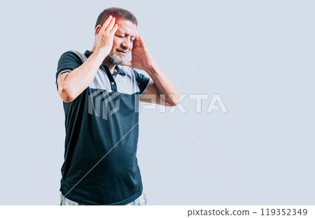 Senior man with headache isolated. Senior person with migraine holding his head isolated Senior man with headache isolated. Senior person with migraine holding his head isolated 119352349