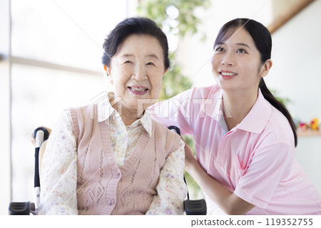 Image of care: Caregivers caring for the elderly 119352755