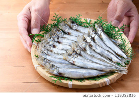 Shishamo (smelt) on a colander Shishamo (smelt) on a colander 119352836