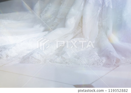 The skirt of the bride walking down the aisle - train 119352882