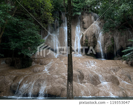 Landscape of beautiful waterfall in the tropical forest. The level of limestone with waterfalls Landscape of beautiful waterfall in the tropical forest. The level of limestone with waterfalls 119353047