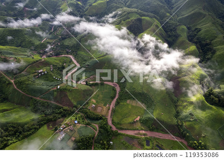 Landscape of Morning Mist with Mountain Layer at north of Thailand. mountain ridge and clouds in rural jungle bush forest Landscape of Morning Mist with Mountain Layer at north of Thailand. mountain ridge and clouds in rural jungle bush forest 119353086