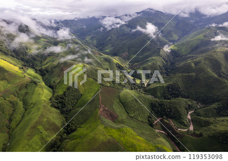 Landscape of Morning Mist with Mountain Layer at north of Thailand. mountain ridge and clouds in rural jungle bush forest 119353098