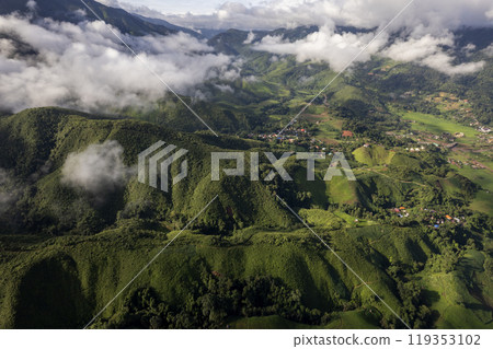 Landscape of Morning Mist with Mountain Layer at north of Thailand. mountain ridge and clouds in rural jungle bush forest 119353102