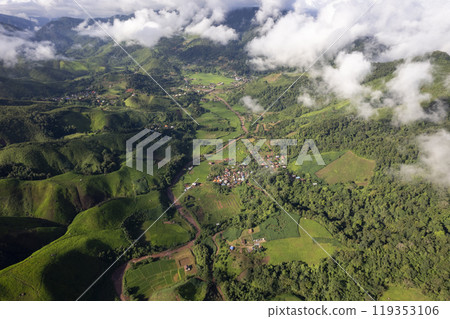 Landscape of Morning Mist with Mountain Layer. mountain ridge and clouds in rural jungle bush forest 119353106