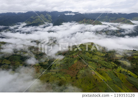 Landscape of Morning Mist with Mountain Layer at north of Thailand. mountain ridge and clouds in rural jungle bush forest Landscape of Morning Mist with Mountain Layer at north of Thailand. mountain ridge and clouds in rural jungle bush forest 119353120