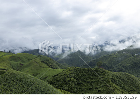 Landscape of Morning Mist with Mountain Layer at north of Thailand. mountain ridge and clouds in rural jungle bush forest Landscape of Morning Mist with Mountain Layer at north of Thailand. mountain ridge and clouds in rural jungle bush forest 119353159