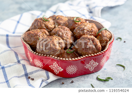 Baked meat patties. 119354024