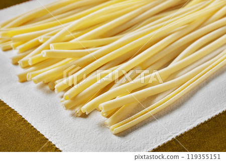 Italian pasta maccheroni ready for cooking Italian pasta maccheroni ready for cooking 119355151