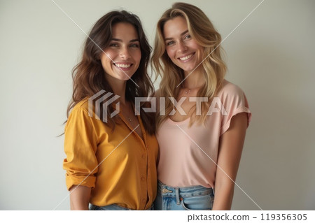 Lesbian happy couple smiles and hugs on a studio background. The concept of same-sex love and tolerance. Lgbtq community, freedom and lgbt people with pride. Generative AI Lesbian happy couple smiles and hugs on a studio background. The concept of same-sex love and tolerance. Lgbtq community, freedom and lgbt people with pride. Generative AI 119356305