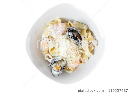Pasta carbonara with sea food in white plate isolated on white background side view 119357487