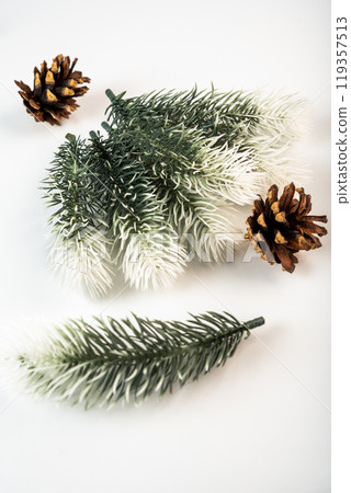 Fake fir tree branch for decorating of bouquets and home. 119357513