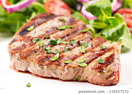 Fillet of beef with salad 119357572