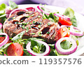 Fillet of beef with salad 119357576
