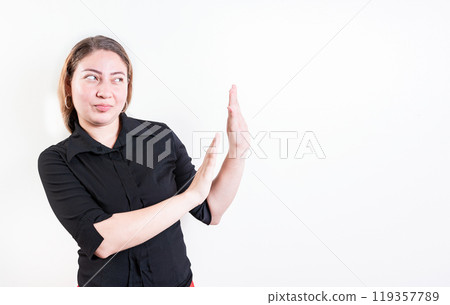 Displeased young woman rejecting with palms hands isolated. Disgusted young woman with rejection gesture. He frowns in disgust 119357789