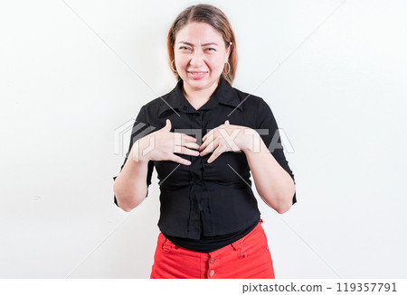 Young woman disgust face isolated. People with face disgusted on isolated background. Latin girl with expression of disgust isolated Young woman disgust face isolated. People with face disgusted on isolated background. Latin girl with expression of disgust isolated 119357791