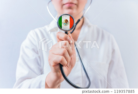 Female doctor holding stethoscope with MEXICO flag. MEXICAN Health and Care concept 119357885